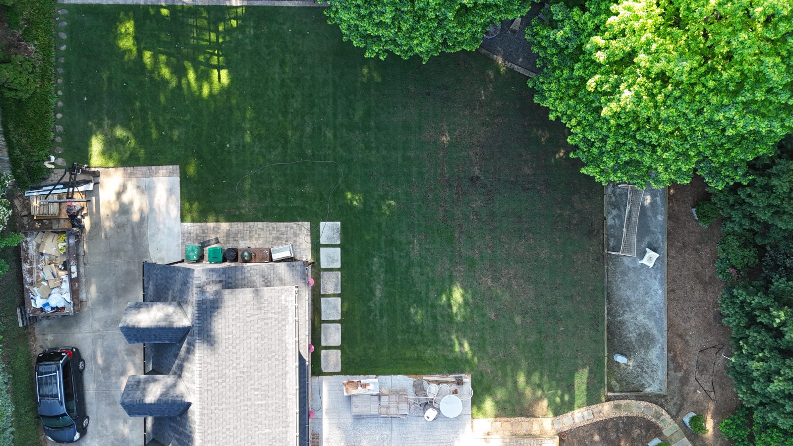 Front-yard Atlanta lawn before soil-first treatment, thin and patchy